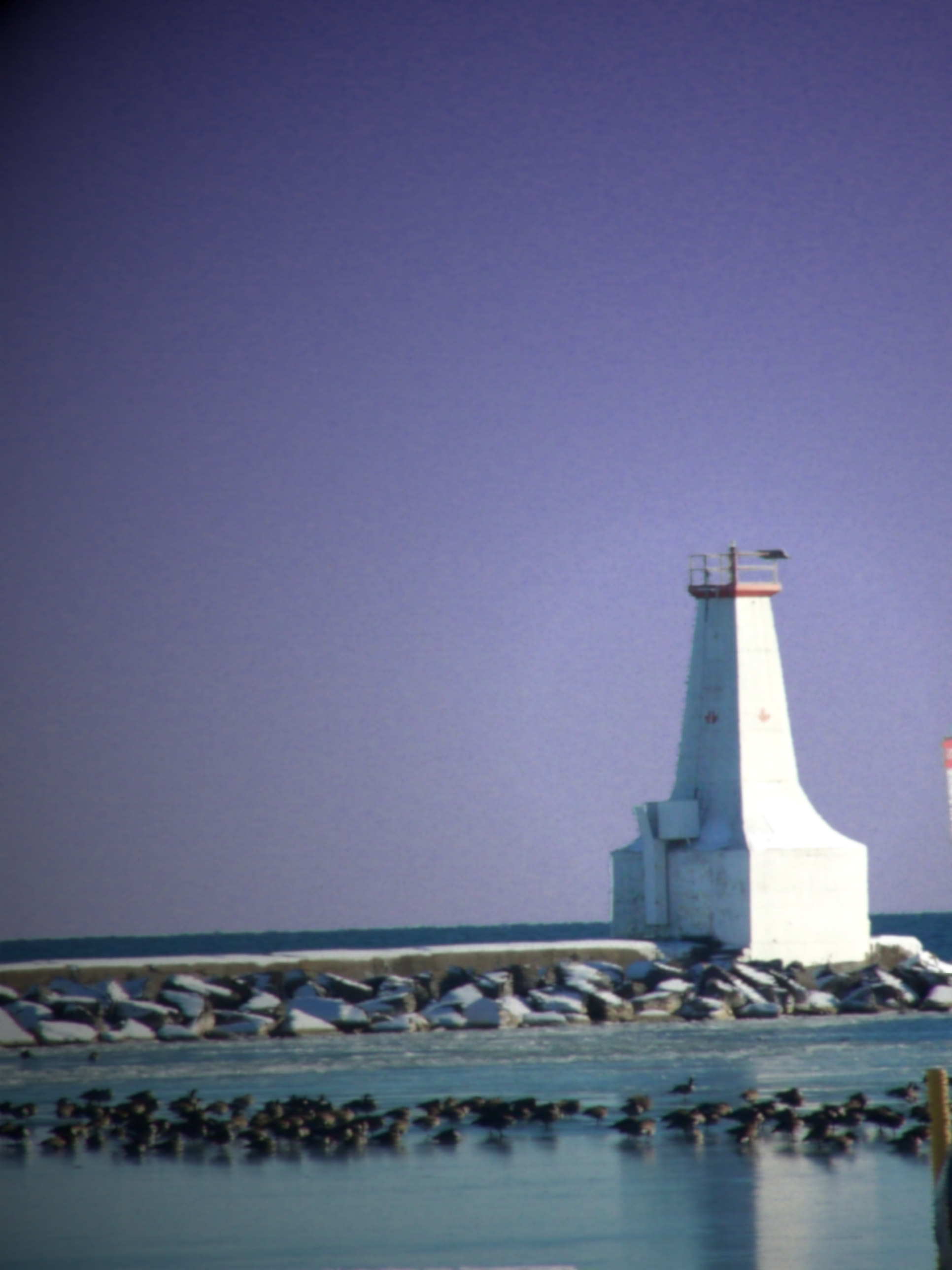 purple sky, blurred, and shaken light house.