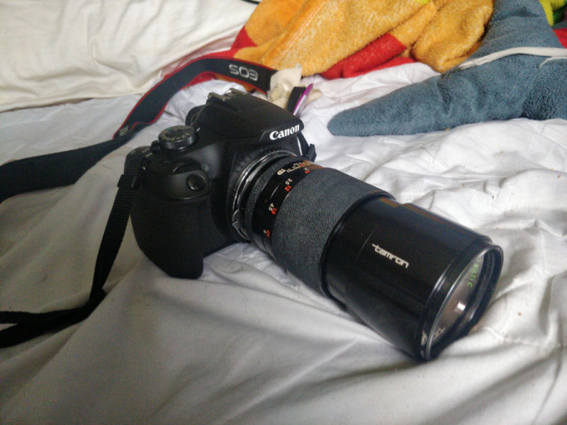 long telephoto lens on a dslr. they are matching.
